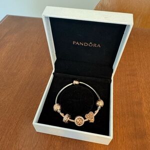 Authentic Pandora Rose bracelet with charms size 7.1